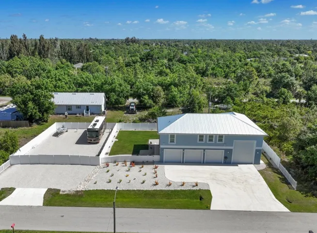 Separate fenced in areas for toys and yard.