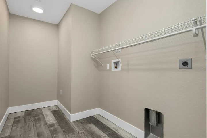 Generous sized laundry room.