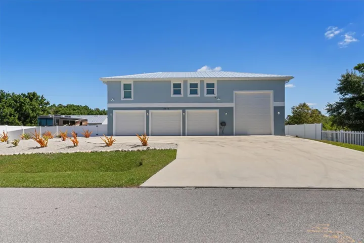 First floor offers spacious 3 bay garage and separate RV garage. Both spaces have their own dedicated A/C unit.