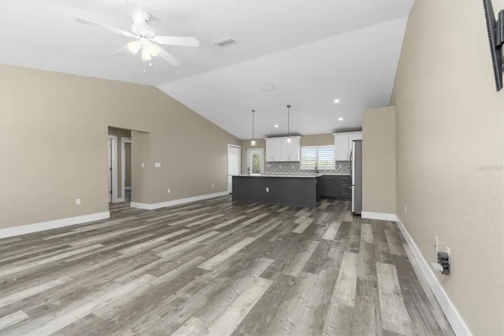 Lots of room for dining, desk area, and seating.