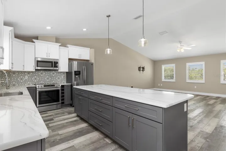 Modern kitchen design with large island.