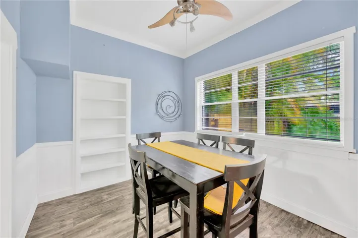 Ample dining room with high ceilings