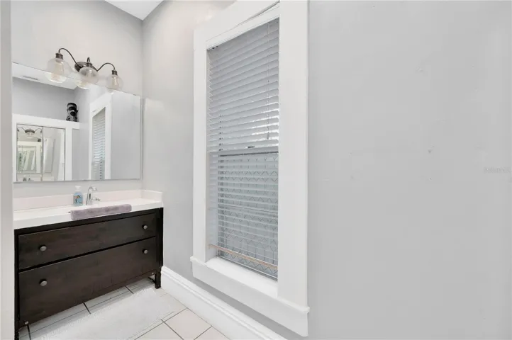 Ensuite for primary bedroom with laundry