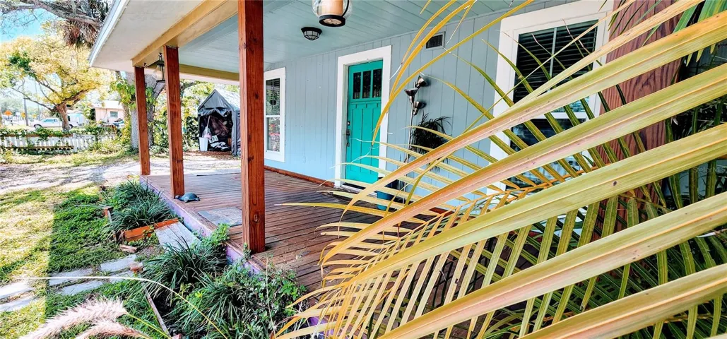 This Old Florida front porch is perfect for sippin sweet tea or other libations