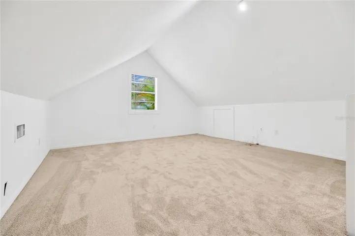 Turn this oversized loft into a playroom, rec room, or primary bedroom.