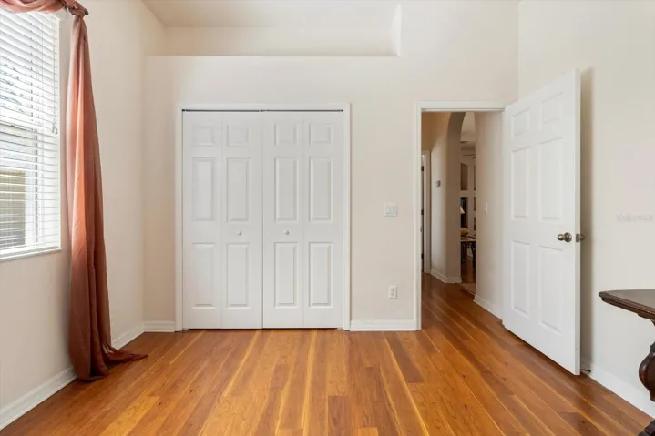Double Bifold Closet w/ Plant Shelf Above