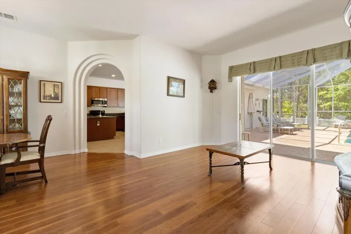 View from the Master Bedroom Doorway Towards the Double Archway that Leads to the Kitchen
