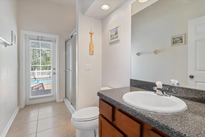 Bathroom 3 w/ Shower...Door to Pool Area