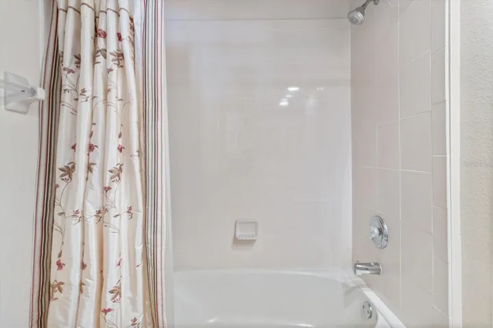Tub/Shower Combo w/ Tiled Surround