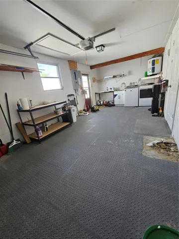 1 Car garage- featuring the New Washer/Dryer