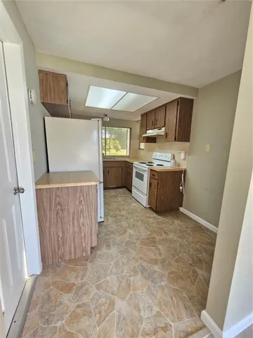 Galley Kitchen- Garage Door on leftside.