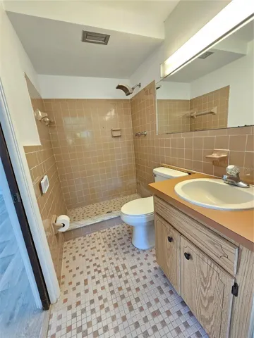 Primary Bathroom. Photo taken from the door that leads to the back patio.