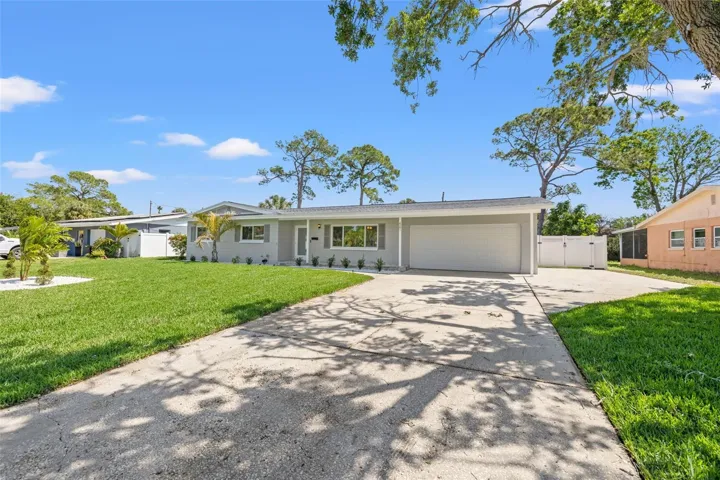 Large driveway and parking pad