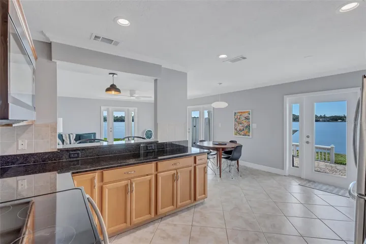 Kitchen with an abundance of light and water views