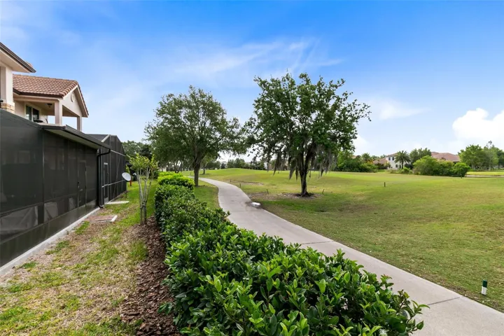 Walkway behind Screened Patio
