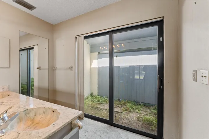 private outdoor garden off of primary bathroom
