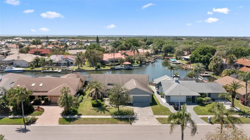 front of home with view of canal in back
