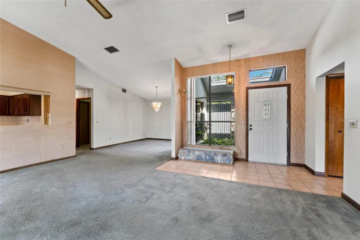 living room looking towards front entry door