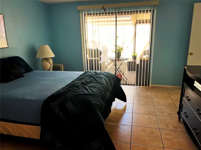 Bedroom 1 with Glass Sliders to Outside