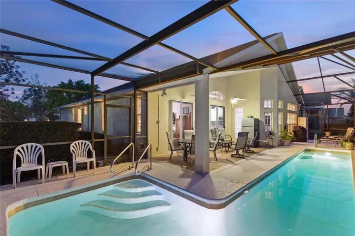 Twilight view of private pool