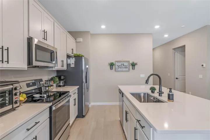 42' Upper White Shaker Cabinets w/ matte black hardware