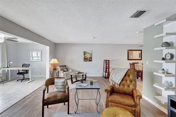 Another view from living room into sunroom