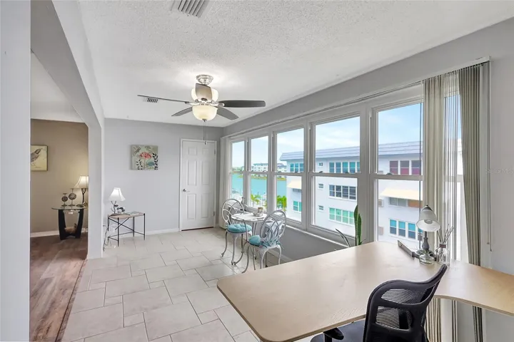 The suntroom is large with a beautiful water view. Make this your office or the guest room.
