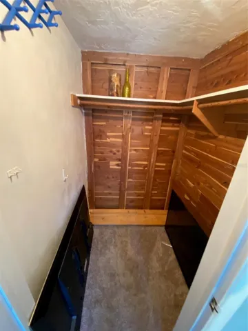 Walk in closet in master bedroom
