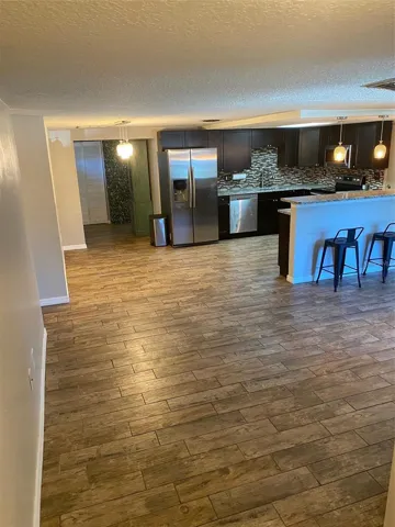 Living Room open to kitchen.