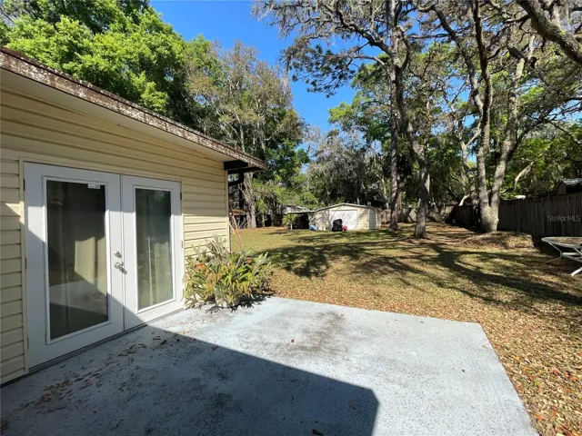 Doors to Bonus Room & Backyard