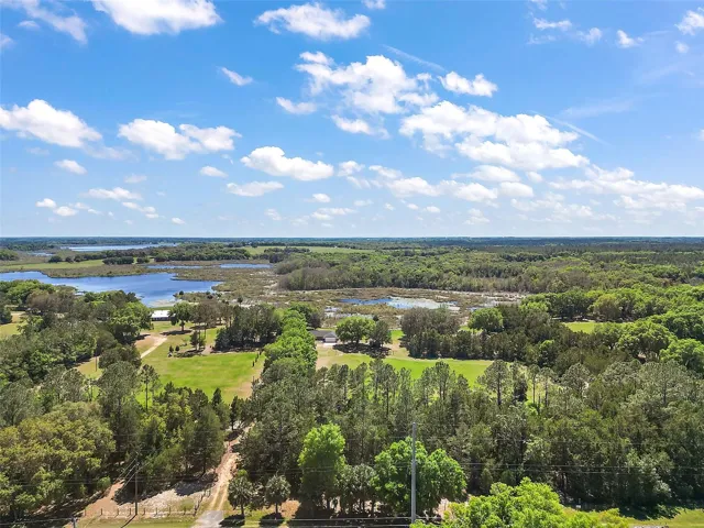 Aerial from 42 to show canal and lake at back of property.