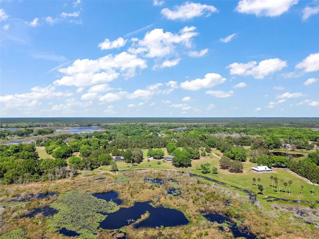 Aerial from Canal to back of Property.