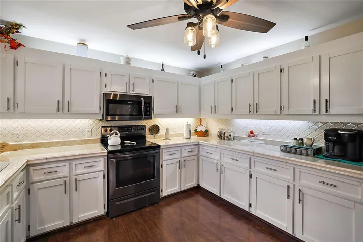 Kitchen has lots of counter space for meal prep.