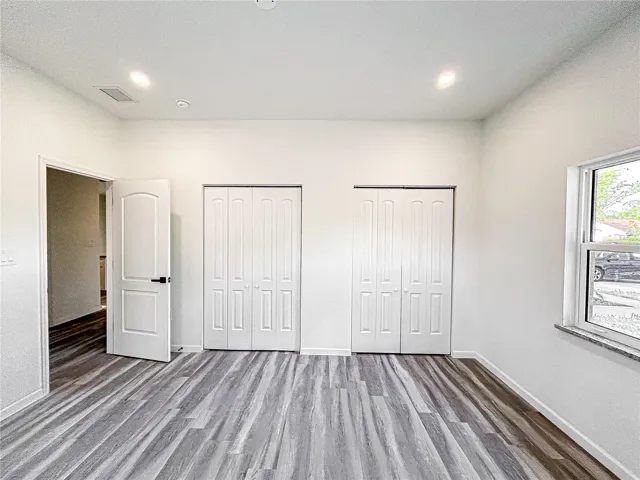 Double closet on guest bedroom 2