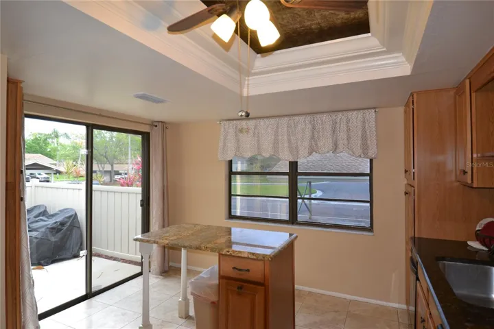 Kitchen breakfast table and slider to front patio