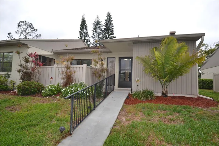 Front entrance with patio up front on the left
