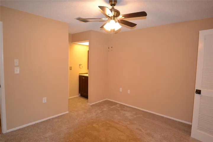 Bedroom 2 with view of vanity area