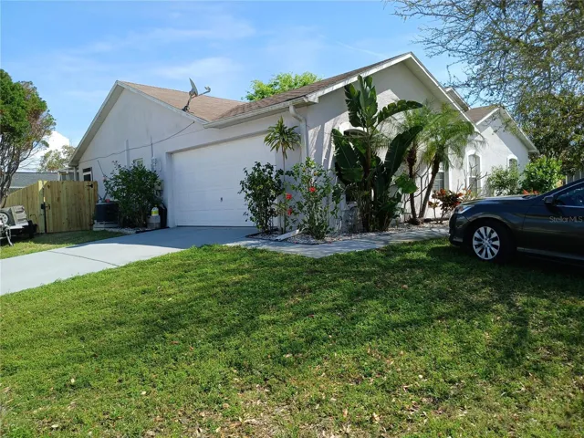 Wester exposure with the two car garage on the side of the home