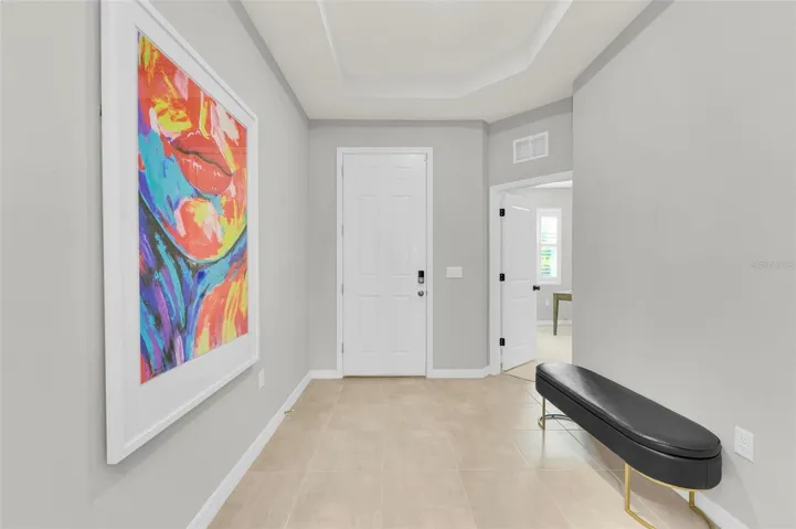 Grand tray ceiling accentuating the entrance, making a striking first impression.