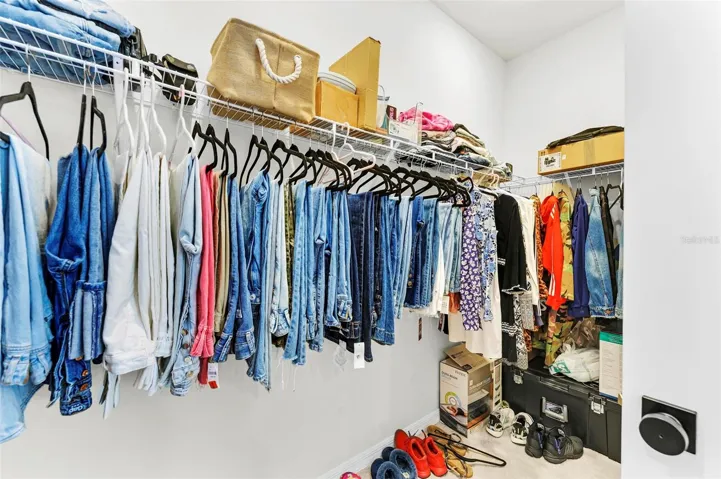Spacious walk-in closet, offering ample room to organize and store your belongings with ease.