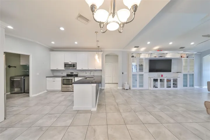 Family, kitchen, and laundry room