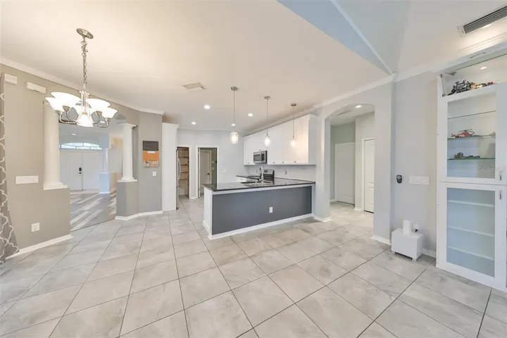 Family room flowing toward the kitchen