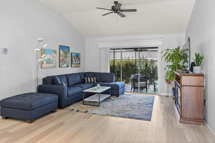 LIVING AREA WITH SLIDING DOORS TO YOUR PRIVATE OASIS