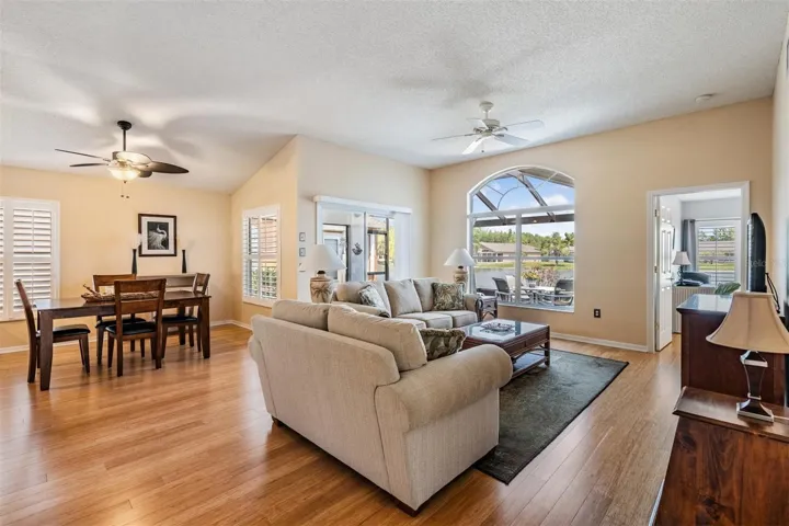 Great room with view of lanai and water