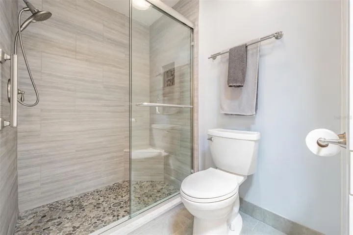 Step-in, glass shower
