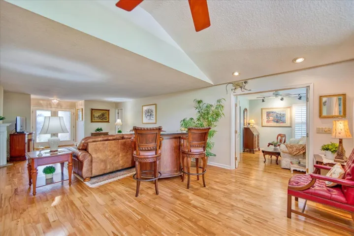 Painted monkey overlooks versatile open space at bonus room entrance~