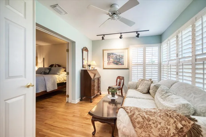 Home office or studio with lots of natural light opens to master suite~
