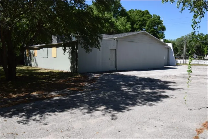 Back of building with A/C on roof