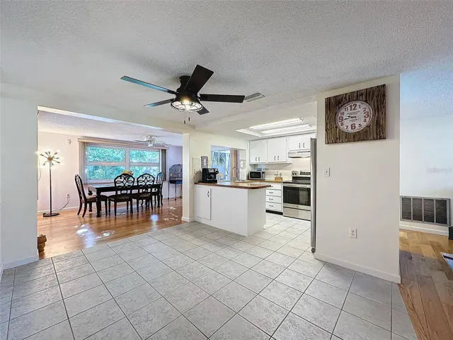Space off kitchen for a table too!