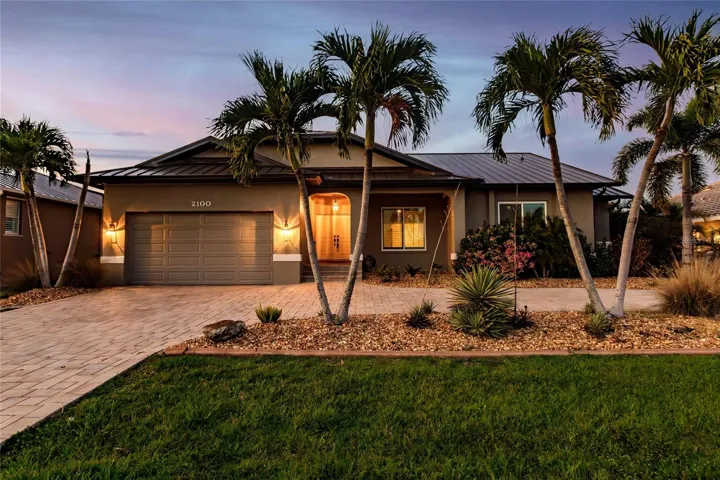 Welcome Home! This luxury home was recently upgraded with hurricane impact windows and doors as well as a Generac whole home generator with inground 500-gallon tank.